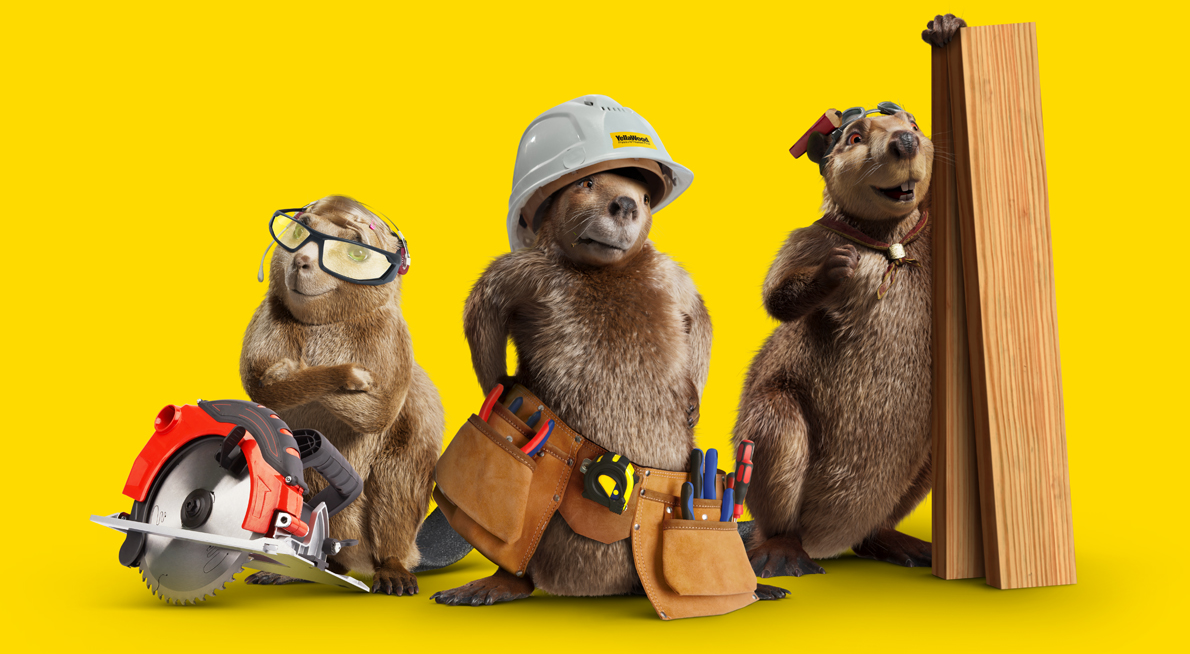 YellaWood beavers posing with power tools
